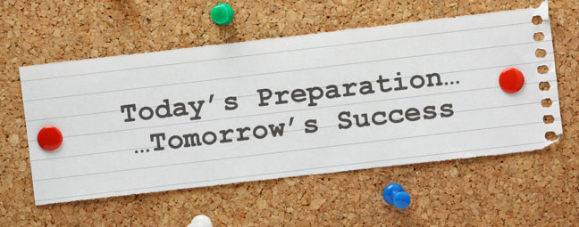 Corkboard with reminder that preparation leads to success